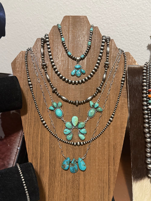 Carico turquoise statement